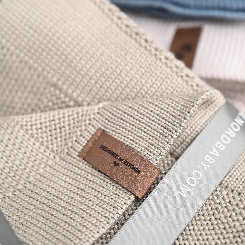 ekxBL8_1769787274_35192_310_0_pck.jpg nordbaby strikket bambusteppe 100×80 cm – bambi, dune